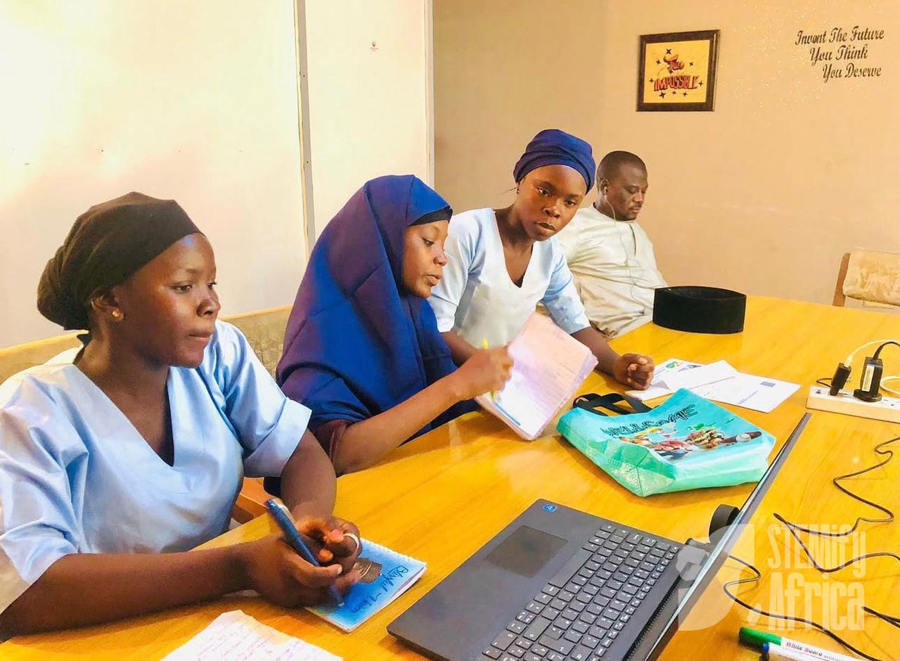 Students working at workshop session